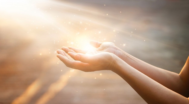 Holding sun in hands